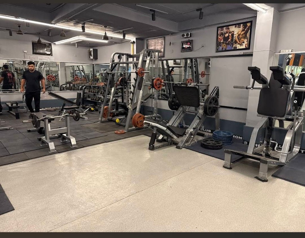 The Iron Club Gym - Premium gym floor with modern strength and cardio equipment